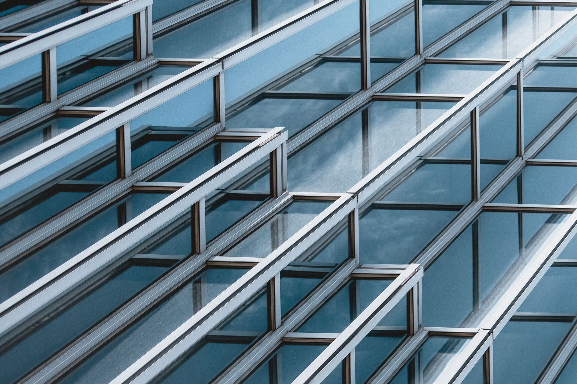 Geometric glass and steel facade of a modern office building